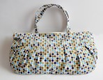 Bolsa de puntos azules cafe